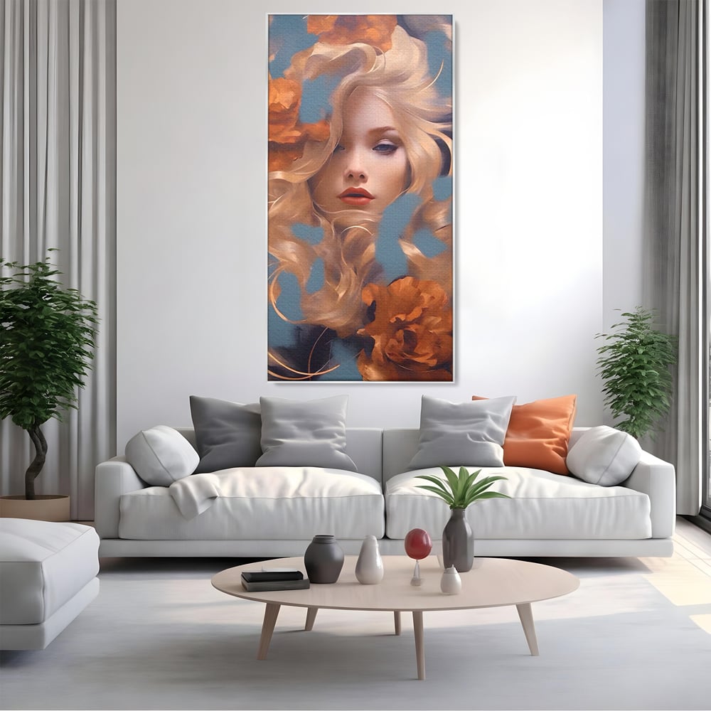Tablou canvas cu portret de femeie cu flori portocalii, in rama de aluminiu argintiu, pe perete intr-un living